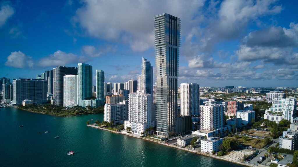Aerial view of waterfront high-rise condo towers in Edgewater, Miami along Biscayne Bay